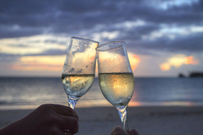 white wine glasses beach